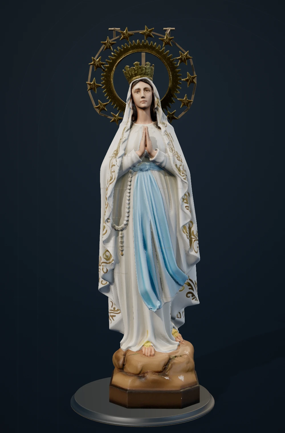 Painted Lourdes sculpture of Mary with joined prayer hands, ivory mantle, blue sash, gold crown and star-ring.